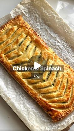 chicken spinach pie sitting on top of a piece of tin foil