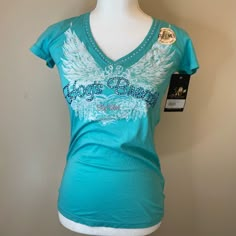 Bee Easy| Crazy Soft Tee Size Small Armpit To Armpit: 14” Inches Waist: 14 1/2” Inches Length: 25” Inches Measurements Are Shown In Pics. Brand New With Tags! Caribbean Blue, Rhinestone Accents, 100% Cotton, V-Neck, Hogs Breath, Key West Crazy Soft Tee. Very Cute Unique Souvenir! Retails For $30.00 Like It Today, Gone Tomorrow. Secure And Purchase Today! Have Questions??!! Comment/ Message Me! Offers??!! Make Offers Now! Or Secure It Yours And Buy Now! Key West Colors, Stitch Fix Women, Womens Golf Shirts, Caribbean Blue, Stretchy Tops, Flutter Sleeve Top, Tops Fall, Key West, Boho Tops