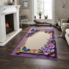 a living room with a fireplace, couch and large purple mat on the floor in front of a fire place