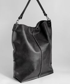 Everyday Leather Crossbody Hobo Bag, Black Textured Leather Bag With Double Handle, Business Faux Leather Shoulder Bag With Textured Finish, Modern Black Leather Hobo Bag, Business Shoulder Bag In Textured Faux Leather, Black Double Handle Textured Leather Bag, Leather Hobo Tote Bag For Business, Black Leather Shoulder Bag With Leather Handles, Textured Leather Hobo Tote Bag