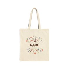 This 100% cotton bag comes in one size - 15" x 16"- perfect for everyday wear. While the canvas material will show off your designs in great colors, it's durable and will last for years. The bag features 20" handles (made from the same canvas), making it easy to carry even with a week's worth of shopping. .: 100% cotton canvas .: Heavy fabric (12 oz/yd² (406.9 g/m .: Sewn-in label Spring Cotton Shoulder Bag For School, Eco-friendly Cotton Bags For Spring, Cotton School Bags For Spring, Spring School Cotton Bags, Cotton Bags For Everyday Use In Spring, Everyday Cotton Bag For Spring, Eco-friendly Cotton Canvas Bag Gift, Eco-friendly Cotton Canvas Gift Bag, Cotton Softback Bags For Everyday Use