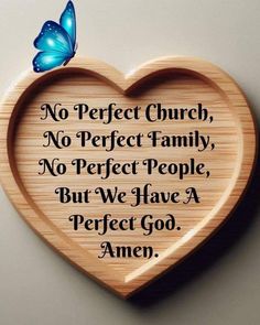 a heart shaped plaque with a blue butterfly on top of it and the words, no perfect church, no perfect family, no perfect people, but we have a perfect