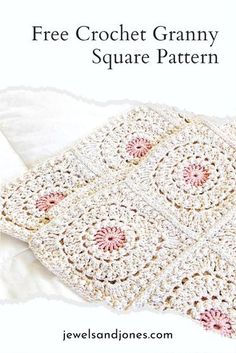 the crochet granny square pattern is shown on top of a white blanket with pink flowers