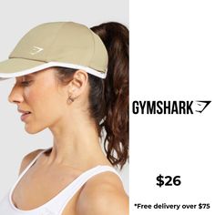 YOU CAN LEAVE YOUR HAT ON The finishing touch to any gym or rest day ‘fit. ‘Cause nothing says hats off to your outfit like, um, a hat. • Sweat-wicking fabric keeps you cool and comfortable• Lightweight curved peak• Ideal for running thanks to lightweight design• Back elastic wrap opening for your ponytail to go through• Internal sweatband SIZE & FIT• Stretches to fit multiple head sizes• Wear it on your head MATERIALS & CARE• 100% Recycled Polyester SKU: I2A1C-NBRS Ponytail Cap, Rest Day, Rest Days, Keep Your Cool, Your Head, Gym, Running, Elastic, Hats