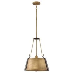 a light fixture hanging from the ceiling with a gold shade on it's side