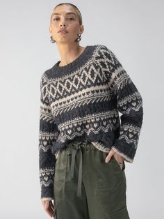 DETAILS Fairisle Crew Neck Light Weight Relaxed Fit Sustainably Sourced SIZE + FIT Model is 5'8", and is wearing a size S. Front Length: 22 1/2" Bust: 41" Sleeve: 30 1/2" FABRIC + CARE 46% Acrylic 38% Recycled Polyester 11% Polyester 5% Wool Speed Wool Machine Wash Cold, Line Dry Imported MADE WITH SUSTAINABILITY IN MIND Recycled polyester is produced from recycled petroleum sources: PET bottles, industrial polyester waste, and even garments. Production requires 59% less energy compared to virgi Holiday Lookbook, Fair Isle Pattern, Drop Shoulder Sweaters, Fair Isle Sweater, Sweater Blouse, Cozy Sweaters, Fair Isle, Color Combos, Crew Neck Sweater