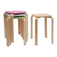 three wooden stools with different colored seats on each one, all stacked up and ready to be used