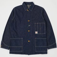 The 2875 coverall jacket from Full Count is a brilliant example of the simple things done well. Based on an early 20th-century workers chore coat, this jacket has become a tried and tested classic of the denim world. Its iconic boxy shape allows it to be easily worn over several layers and its beautiful lightweight denim means that it doesn’t stifle in the summer heat. Four vintage style gold buttons make up the front fastening and two large lower patch pockets have been added for convenience, w Japanese Workwear Vintage, Full Denim Outfit, Workers Jacket, Ladbroke Grove, Japanese Workwear, Style Council, Boxy Jacket, Clothes Brand, Japanese Selvedge Denim