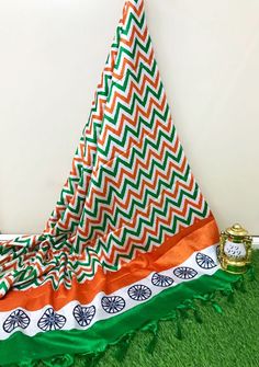 Khadi Silk Indian Flag Tri Color Dupatta Zig Zag Lehriya Dupatta. With Chakra Border.  Carry this dupatta with pride with any of your favorite outfits be it salwar kameez, jeans top, or kurti Palazzo pant and  top, with long dress. Carry like a dupatta, wrap or Stole. Please note the we offer expediate shipping, that only speeds up the shipping time, our processing time will not be effected. Green Block Print Dupatta For Festivals, Green Block Print Traditional Wear For Navratri, Green Block Print Traditional Wear For Diwali, Green Traditional Wear With Block Print For Navratri, Green Cotton Dupatta For Festivals, Traditional Green Cotton Dupatta, Green Cotton Traditional Wear With Traditional Patterns, Green Traditional Wear With Block Print For Diwali, Green Cotton Traditional Wear With Patterns