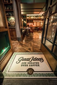 there is a sign on the floor that says great indoors are created over coffee and other things