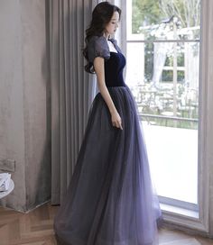 A-line Tulle Gown For Prom, A-line Tulle Evening Dress For Homecoming, A-line Tulle Ball Gown For Prom Season, Formal Floor-length Tulle Maxi Dress, Formal Tulle Maxi Dress With Sweep Train, Banquet Ball Gown Evening Dress With Tulle Skirt, Formal A-line Tulle Ball Gown, Tulle Maxi Dress For Prom, A-line Tulle Ball Gown For Evening