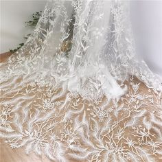 Beautiful Embroidery flower lace fabric This is a new style in high quality. Great for wedding dress, evening gown, Costume, cocktail dress Color: white Width - 51 inches, Length - yard Wholesale acceptable, please convo me Shipping Time: United Sates: 10-15 working days United Kingdom:10-15 working days Canada: 10-15working days Australia: 10-15 working days Asia:4-8 working days Europe: 10-20 working days need express mail service , please contact us we only refund for the lace , not included Fitted Lace Wedding Dress With Floral Embroidery, Fitted Lace Tulle Fabric With Floral Embroidery, Wedding Tulle Fabric With Lace Patchwork, Lace Tulle Fabric With Floral Embroidery For Wedding, Wedding Tulle Fabric With Floral Lace Embroidery, White Lace Wedding Dress With Floral Embroidery, White Lace Wedding Dress With Lace Patchwork, Wedding Dress Bridesmaid, Lace Diy