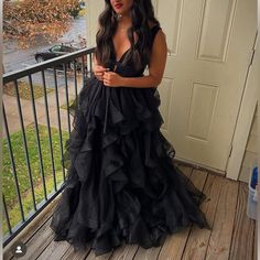 Sherri Hill, Multi-Layered Gown Black V-neck Gown With Sweep Train, Black Ruffled Gown For Prom Season, Black Ruffle Gown For Prom Season, Black Ruffled Gown For Wedding, Black Ruffled Maxi Dress For Wedding, Black Evening Gown For Prom Season, Black Floor-length Dress With Ruffles, Black Ruffled Evening Dress For Prom Season, Black Gown For Prom Season Evening