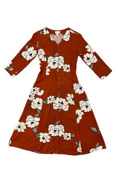 Our long 3/4 sleeve Fiona Dress is a big favorite so we brought it back again in a rust colored rayon challis with giant floral print. A nostalgic prairie style is midi length and hits just below the knee. Front faced V neck line. 17 brass buttons with spaghetti style looping with hidden placket so the buttons won't gap. Princess seams with no waist hem for a long lengthening look. Center back elastic smocking for breathability and movement. Patch pockets meet at seams. Made from deadstock rayon Field Day, Prairie Style, Rust Color, Princess Seam, Small Bust, British Indian, Midi Length, Magnolia, Smocking