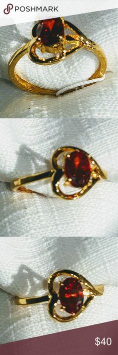 Beautiful dainty garnet heart ring Fun and dainty garnet ring in the shape of a heart. 14k yellow gold Over silver. Sz 7. Also available in citrine and peridot Jewelry Rings Heart-shaped Gemstone Ring For Valentine's Day, Gold Gemstone Heart Ring For Promise, Gold Heart Rings With Birthstone, Gold Heart-shaped 14k Gold Ruby Ring, Gold Heart Ring With Gemstone For Valentine's Day, Gold Gemstone Ring For Valentine's Day, 14k Gold Heart-shaped Ruby Ring, Gold Ruby Ring For Valentine's Day, Gold Heart-shaped Ruby Ring In 14k Gold