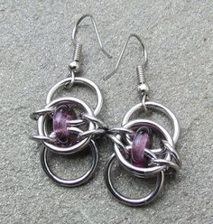 Purple Earrings, Chain Maille Earrings, Stainless Steel and Purple Glass Earrings, Dangle Earrings Purple Pierced Metal Jewelry, Purple Metal Pierced Jewelry, Modern Purple Metal Jewelry, Purple Metal Dangle Earrings, Purple Dangle Metal Earrings, Purple Round Metal Earrings, Gift Jewelry With Jump Ring Dangles, Chainmaille Jewelry Patterns, Chainmaille Earrings