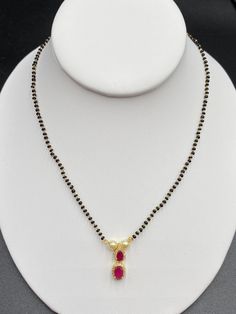 Single line black beads chain with Ruby Stones pendant Handmade jewelry One gram gold jewelry Silver plated jewelry Official Website globusfashions.com 🌸 S H O P . M O R E . S T Y L E S 🌸 https://www.etsy.com/shop/Globusfashions Necklaces - https://www.etsy.com/shop/Globusfashions?section_id=18712263 Bracelets - https://www.etsy.com/shop/Globusfashions?section_id=18969767 Pendant Sets - https://www.etsy.com/shop/Globusfashions?section_id=18707402 Tikka - https://www.etsy.com/shop/Globusfashion Wedding Necklace With Round Beads And Chain, Black Round Beads Temple Necklace, Black Temple Jewelry Necklace With Round Beads, Black Temple Jewelry With Gold Beads, Black Beaded Necklace For Celebration, Black Beaded Necklaces For Celebration, Elegant Black Necklace With Gold Beads, Elegant Black Necklaces With Gold Beads, Elegant Black Necklace For Celebration