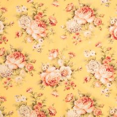 a yellow floral fabric with pink and white flowers on the front, in full bloom