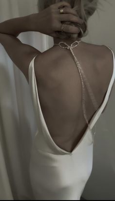 Not your grandma’s pearl necklace— asymmetrical strands of freshwater pearls are knotted into a choker for a dramatic yet iconic vintage moment. — See below for additional details // Elegant Pearl Choker With Clavicle Chain, Elegant Pearl Chain Choker For Party, Elegant Wedding Choker With Clavicle Chain, Elegant Beaded Choker For Formal Occasions, Elegant Formal Beaded Choker, Chic Pearl Clavicle Necklace For Wedding, Elegant Pearl Embellished Choker, Chic Wedding Pearl Necklace With Clavicle Chain, Chic Pearl Choker For Wedding