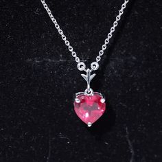 Product Details Experience the elegance of simplicity with this Created Ruby Heart Necklace, symbolizing courage and unshakable willpower in life. Adorned with a classic heart-shaped Created Ruby in a prong setting, this created ruby necklace is the perfect accessory for your wedding anniversary or any special occasion. Product Information SKU SHP-PENDANT042167670 Weight 2.48 gm (Approximate) LAB CREATED RUBY INFORMATION No.of Stones 1 Pieces Total Weight 2.00 Carat (Approximate) Dimension(approx) Heart-8X8 mm-1 Pcs Color Red Cut Brilliant Shape Heart Setting Type Prong-Setting Quality Grade AAAA View More Product Parent Collection Handle lab-created-ruby-necklace Ruby Heart Necklace, Ruby Heart, Solitaire Necklace, Ruby Necklace, Solitaire Necklaces, Signature Jewelry, Timeless Jewelry, Conflict Free Diamonds, Free Jewelry