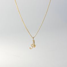 A timeless piece that will never go out of style. This 14K gold calligraphy pendant is the perfect and most stunning way of keeping a name close to your heart. We handmade each piece so you can assure you're getting a one-of-a-kind pendant that is not like any other. This 14K solid gold letter pendant is flawlessly crafted to look super chic and elegant around your neck. Pair it with a nice gold chain and wear it with almost all of your outfits. The piece is such a versatile lettering necklace. Elegant Gold Initial Necklace With Name Detail, Elegant Gold Initial Pendant Name Necklace, Gold Sterling Silver Name Necklace With Charms, 14k Gold Name Necklace With Charms For Anniversary, Yellow Gold Initial Pendant Jewelry With Initials, Elegant Initial Pendant Necklace, Gold Plated Initial Pendant Necklace For Anniversary, Gold Plated Initials Name Necklace For Anniversary, Hallmarked 14k Gold Initial Pendant Necklace