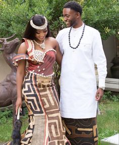 a man and woman standing next to each other