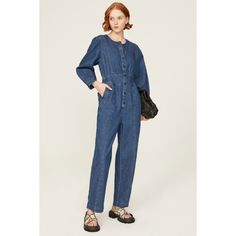 Blue denim (76% Cotton, 21% Hemp, 3% Elastane). Jumpsuit. Long sleeves. Crewneck. 29" inseam. 12" rise. Imported. Workwear High Rise Denim Jumpsuit With Button Closure, Denim Blue Button-up Jumpsuit For Work, Workwear Denim Jumpsuit With Button Closure, Medium Wash Relaxed Fit Jumpsuits And Rompers For Work, Relaxed Fit Medium Wash Jumpsuits For Workwear, Denim Straight Leg Jumpsuits For Work, Denim Blue Straight Leg Jumpsuits For Work, Denim Blue Workwear Jumpsuits And Rompers With Button Closure, High Rise Cotton Denim Jumpsuit For Work