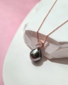 Bright, chic, lustrous and bold Tahitian pearl pendant that you have to have for your jewelry box. Both versatile and timeless, they will quickly become your go-to-necklace for everyday and special occasions.  Perfect gift to treat yourself or as a special gift that will be loved and cherished.  No two pearls are exactly the same. Embrace the perfect imperfection. Embrace uniqueness. Embrace individuality. Celebrate you. ♡ Sea Pearl Type: Tahitian Pearl♡  ✧ Tahitian Pearl size: Approx 10mm (widt Elegant Tahitian Pearl Jewelry With Pearl Charm, Elegant Tahitian Pearl Drop Necklace, Elegant Pearl Necklace For Mother's Day Gift, Luxury Teardrop Pearl Necklace Gift, Luxury Teardrop Pearl Necklace For Gift, Gift Tahitian Pearl Necklace With High Luster, Elegant Tahitian Pearl Necklace With Pearl Charm, Tahitian Pearl Drop Necklace As Gift, Tahitian Pearl Drop Necklace For Gift