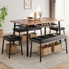 a dining room table with four benches and baskets on the floor in front of it