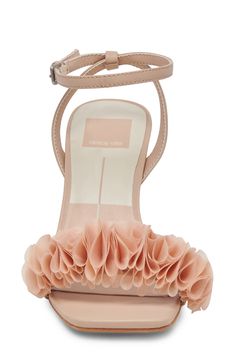 Voluminous ruffles add modern elegance to the vamp of a soirée-ready sandal framed by a squared-off toe and flared block heel. 3 1/4" heel (size 8.5) 3" strap height Adjustable ankle strap with buckle closure Leather and textile upper/synthetic lining and sole Imported Strap Sandals Women, Elegant Shoes, The Vamps, Modern Elegance, Ankle Strap Sandals, Height Adjustable, Block Heels, Ankle Strap, Ruffles