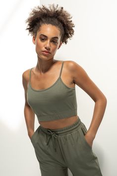 A comfy loungewear essential ready to wear on its own or as an underlayer, this cropped top/bralette is made from a mixture of regenerated cotton and recycled polyester. Double layer front for secret support. Adjustable cami straps. The sustainable generation is here. Matching Joggers Available!   Fibre Content: 48% Regenerated cotton, 47% Recycled polyester, 5% Elastane Machine Washable. Shop the full collection at www.thisisanyo.co.uk T Shirt Crop Top, Purple Sky, Cropped Tops, Cropped Cami, Cropped Tube Top, Cami Crop Top, Bralette Tops, Womens Tunics, Staple Pieces