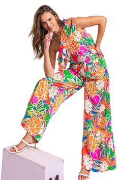 Take your style to new heights with the Perfect Floral High Waist Pant! This playful pant features a pink cobalt and orange abstract print that will make a statement wherever you go. The high waist and stretch top ensure a comfortable and flattering fit. Get ready to turn heads and make a bold fashion statement! 100% Polyester Casual Multicolor Floral Print Pants, Tropical Stretch Bottoms With Floral Print, Stretch Tropical Bottoms With Floral Print, Tropical Stretch Floral Print Bottoms, Spring Multicolor Print Pants With Elastic Waistband, Spring Multicolor Print Bottoms With Elastic Waistband, Summer Bold Print Wide Leg Bottoms, Summer Wide Leg Bottoms With Bold Print, Summer Wide-leg Bottoms With Bold Print