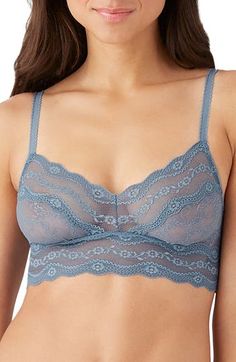 This sheer bralette looks cute (while being incredibly comfy) in slightly stretchy lace with a wide elastic band. 89% nylon, 11% spandex Hand wash, line dry Imported Lingerie Lace Camisole Bra With Removable Pads, Stretch Camisole Bra With Delicate Lace, Lace Camisole With Removable Bra Pads, Lace Camisole With Built-in Bra, Bra Friendly Lace Camisole, Seamless Stretch Lace Bra, Lace Underwire Bra With Stretch, Lace Underwire Camisole Bra Friendly, Stretch Lace Camisole Bra Friendly