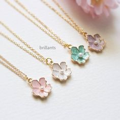 Cherry blossom pendant necklace in gold. ▶▶ You can make this necklace personal choosing the initial from option. You can add more initials from following link. https://www.etsy.com/listing/188788608/personalized-initial-leaf-charms-for ▶ Material - Gold plated over brass, pearl ▶ Chain Length - Sakura Necklace, White Sakura, Cherry Blossom Necklace, Blossom Bracelet, Flower Girl Necklace, Flower Girl Jewelry, Girl Necklace, Accesories Jewelry, Necklace For Her