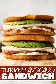 turkey avocado sandwich stacked on top of each other with the words turkey avocado sandwich above it