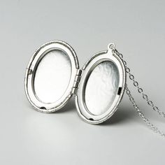 "A gold, rose or antiqued silver locket with short, mid length or long chain and gorgeous floral pattern. Great medium size that is hard to find. Lovely on its own or perfect for layering with a choker. Beautiful gift for a special person, flower girl, bridesmaids or mother. D E T A I L S : -High quality sterling silver, 14kt gold fill and 14kt rose fill chains -Antiqued silver plated locket, semi shiny rose plated locket or solid golden raw brass locket -Flower pattern placement may vary in the Rose Locket, Locket Jewelry, Gold Locket Necklace, Oval Locket, Oval Necklace, Gold Long Necklace, Gold Locket, Flower Girl Gifts, Long Chain Necklace