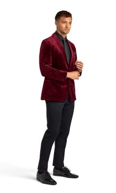 A slim burgundy velvet tuxedo coat with one button and a shawl lapel. Luxury Burgundy Blazer For Formal Occasions, Semi-formal Burgundy Blazer For Fall, Classic Burgundy Blazer With Suit Collar, Elegant Velvet Blazer For Evening, Elegant Velvet Evening Blazer, Classic Burgundy Blazer For Semi-formal Occasions, Formal Burgundy Single-breasted Outerwear, Elegant Single Breasted Burgundy Blazer, Burgundy Fitted Outerwear For Semi-formal Occasions