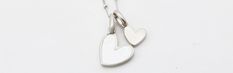 The small heart charm is engravable to showcase your favorite friends and loved ones. You have a heart of gold and now you’ve found the perfect pair. 
See here for additional heart charms. Everyday White Heart Charm Necklaces, Everyday White Heart Charm Necklace, Everyday White Charm Necklace With Heart Pendant, Everyday White Heart Pendant Charm Necklace, Heart Charms For Anniversary, Heart-shaped Charm Necklaces With Removable Charms, White Gold Charm Necklaces For Valentine's Day, Everyday White Gold Charm Necklaces For Valentine's Day, White Sterling Silver Charm Necklace With Heart Charm