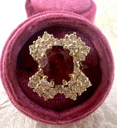 Elevate your look with this gorgeous Ruby Diamond 14kt Yellow Gold Estate Ring. Crafted with 14kt yellow gold, an opulent 2 carat oval Ruby, and 2.10 carats of Natural Diamonds, this exquisite Estate Ring exudes elegance and sophistication. An heirloom to cherish.-2.0 carat Oval Ruby-2.10 carats Natural Round Diamonds-14kt Yellow Gold-Size 6.75