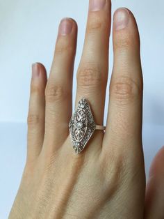 Once in a Blue Moon beautiful vintage finds.  Cz Diamond Filigree Ring // 925 Solid Sterling Silver Size: 5-12 US *Message for sizing options Setting Size: 28 x 14 mm TCW: 0.17 ct Weight: 2.94 g Band width: 1.9 mm Free Shipping, comes in ring box ready to gift!🎁 ~Why Cubic Zirconia?~ CZ is a lab created stone with the closest resemblance to Diamond. In recent years, developers have succeeded in adding color to CZ, making it an affordable alternative to almost any gemstone you can imagine!  Our shop offers jewelry with CZ and natural gemstones, however only created stones have the benefit of being truly flawless and affordable for any budget!✨ Large Wedding Rings, Antique Amethyst Ring, Art Deco Filigree, Once In A Blue Moon, Emerald Ring Vintage, Art Ring, Labor Day Sale, Deco Ring, Peridot Ring