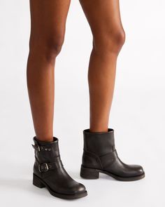 Elevate your style with the RAMPANT moto boot. Constructed with an ankle bootie design and sturdy lug sole, these boots are perfect for making a statement. The sleek leather adds a touch of sophistication to any outfit. 2 inch heel height 12 inch shaft circumference 5.5 inch shaft height Leather upper material Leather lining Leather sock Synthetic sole Imported High Ankle Moto Boots With Padded Ankle For Work, Edgy Leather Boots With Lug Sole, Fall Ankle Moto Boots With Reinforced Heel, Edgy Leather Mid-calf Boots With Lug Sole, Moto Boots With Lug Sole And High Ankle, Fall Moto Combat Boots With Round Toe, Trendy Leather Mid-calf Boots With Lug Sole, Trendy Ankle-high Boots With Leather Footbed, Edgy Ankle Combat Boots For Workwear