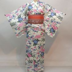 Yukata; This Japanese cotton kimono yukata features wave on a white background. Wear this beautiful robe on summer day or hang it as a display to admire daily. Item: Yukata Cotton Kimono / Obi belt is not included. No.ktm170 Size: US  M-L   /  Length  64 inch (163cm) , Width 26.7 inch (68cm). If you are 155cm - 167cm tall, This yukata would fit well, Condition: NEW. Please check the photos. Need a Obi Sash? Find it here: https://www.etsy.com/shop/KimonoFujiyamarock?ref=seller-platform-mcnav&sect White Yukata, Obi Sash, Kimono Obi, Cotton House, Kimono Japanese, Kimono Yukata, Obi Belt, Cotton Kimono, Japanese Cotton