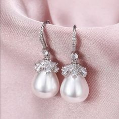 Brand New Women's Hanging Pearl & Diamond Earrings 18k White Gold Plated Sterling Silver Genuine 2ct Lab Created Diamonds Real Natural Freshwater Pearls Measurements 1.5" H X .5" W Retail Price $295 Buy With Confidence From A Trusted Seller W/ A 99%+ Rating! A0250 (Id-189-) Formal White Gold Pear-shaped Earrings, Formal Pear-shaped White Gold Earrings, Fine Jewelry Teardrop Bridal Earrings With Elegant Design, Luxury Dangle Teardrop Earrings For Anniversary, Teardrop Bridal Earrings With Elegant Design, Formal White Gold Pear Shaped Earrings, Formal White Gold Pear Earrings, Luxury Diamond Accents Teardrop Earrings For Gift, Luxury Teardrop Earrings With Diamond Accents As Gift