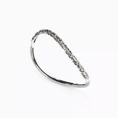 A masterwork of design, forever ahead of the curve. Rare Diamonds, Twisted Bangle, Colorless Diamond, Silicone Bracelets, Vs Diamond, American Jewelry, Bracelet Sizes, Ring Bracelet, White Gold Diamonds