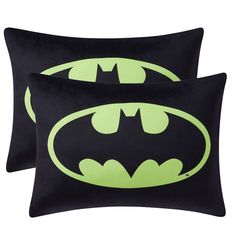 two black and green batman pillows