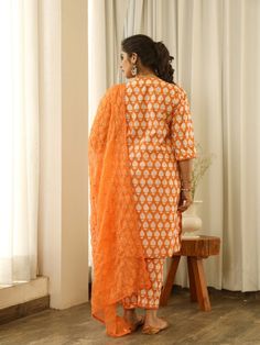 Beautiful handcrafted straight kurta pants set in pure cotton with lovely matching cotton doriya dupatta that is rightly finished with mirror embroidery. Color: Orange Fabric: Cotton and Kota Doria Note: Length and sizes can be customised Length - Kurta 40 inches Pants 38 inches Available in other colors If you happen to see some deformity in hand-work or fabric, that’s mere the technique of the same and not a defect. The garment is quite premium. The product will be delivered within 20-25 days