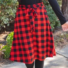 Hey there fashionista! If you're looking for a skirt that's both stylish and versatile, then our Plaid Eden Skirt in Red is just what you need! This skirt is the perfect addition to your winter wardrobe, with its beautiful plaid pattern and flattering cut that's sure to turn heads. And let's not forget about the feminine bow detailing that adds a touch of elegance to the overall look. One of the best things about this skirt is its versatility. You can style it in so many ways, making it a great transition piece as the weather gets colder. Dress it up with a blouse and heels for a night out, or keep it casual with a sweater and boots for a cozy day in. Speaking of sizing, we've got you covered. This skirt comes in sizes Small (0-4), Medium (6-8), Large (10-12), and XL (12-14). And don't wor Sewing With Elastic, Belt Skirt, Maxi Skirt Dress, Skirt Belt, Knee Length Dresses, Romper Pants, Knee Length Skirt, Plaid Flannel, Tie Belt