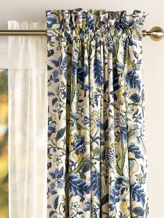 a curtain with blue and yellow flowers on it