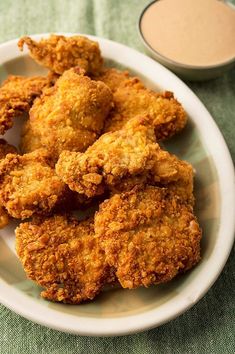 some fried food is on a white plate