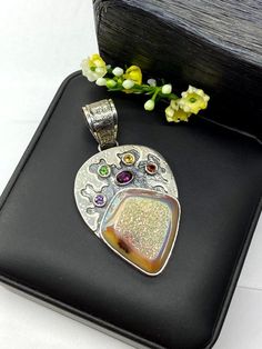 "ARTISAN RAINBOW DRUZY PENDANT Hand-made Sterling Silver 925. Stones used: Rainbow Druzy, Pink Tourmaline, Citrine, Green Sapphire, Garnet, Amethyst.. Height -2 9/16\" (including bail), Width - 1 1/16\" Height - 65mm (including bail), Width - 34mm Unique Handcrafted One-of a-kind Design Pendant Each Piece of Jewelry in my Collection is Absolutely One of a Kind! When you start wearing a piece of my jewelry you will fall in love with it more and more each day and feel that good Energy and Love tha Multicolor Stone Setting Jewelry Gift, Multicolor Jewelry With Stone Setting For Gift, Multicolor Stone Setting Jewelry For Gifts, Traditional Multi-stone Gemstones For Gifts, Traditional Multi-stone Gemstones As Gift, Handmade Teardrop Sterling Silver Gemstones, Handmade Sterling Silver Teardrop Gemstones, Handmade Spiritual Sterling Silver Gemstones, Handmade Sterling Silver Gemstones For Anniversary